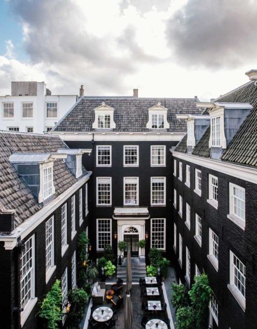 A view from one of the rooms in luxury boutique hotel Royal Gate Resort, member of the leading hotels of the world. View on the building and the secluded garden.