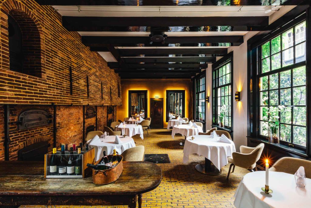 Interior of 2 Michelin star restaurant Vinkeles, in luxury boutique hotel, Royal Gate Resort.