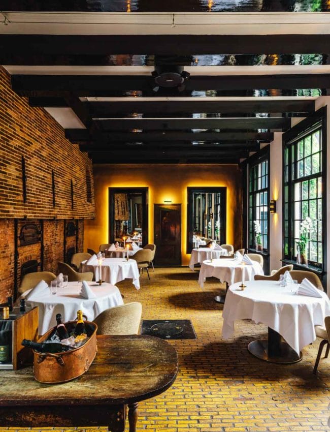 Interior of 2 Michelin star restaurant Vinkeles, in luxury boutique hotel, Royal Gate Resort.