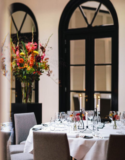 Close up shot of a set-up table in the Ariana meeting and private dining venue at Royal Gate Resort, boutique hotel and part of The Leading Hotels of The World