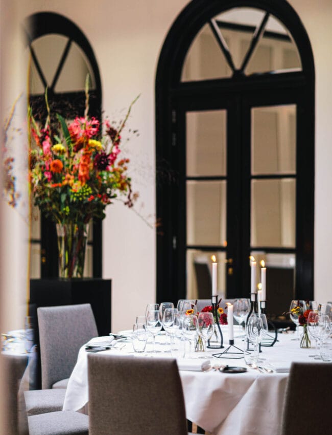 Close up shot of a set-up table in the Ariana meeting and private dining venue at Royal Gate Resort, boutique hotel and part of The Leading Hotels of The World