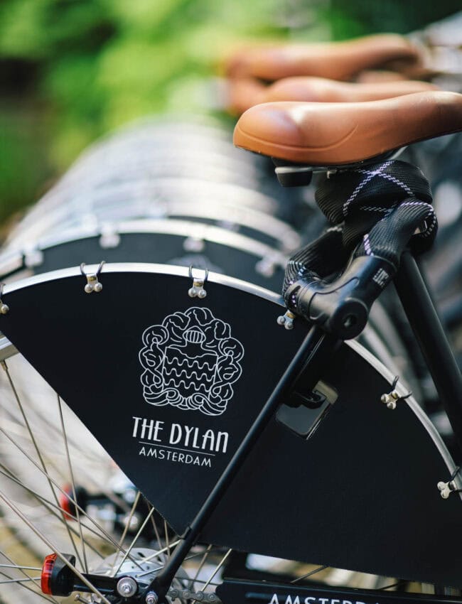 Dylan bicycles lined up in the hotel's courtyard